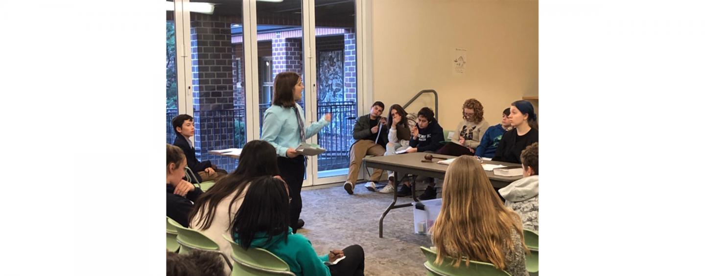 student giving speech in The Commons