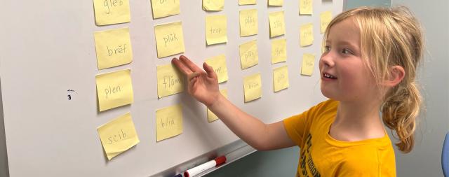 Girl at whiteboard